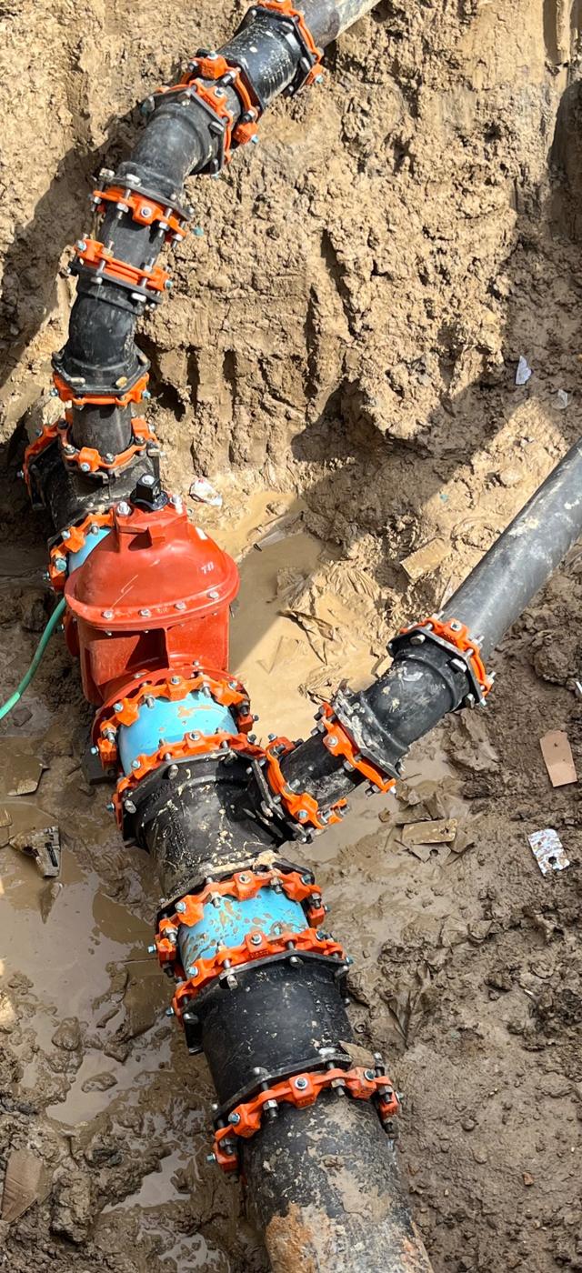 The 12 inch line valve and connections that route water through the pump and filter