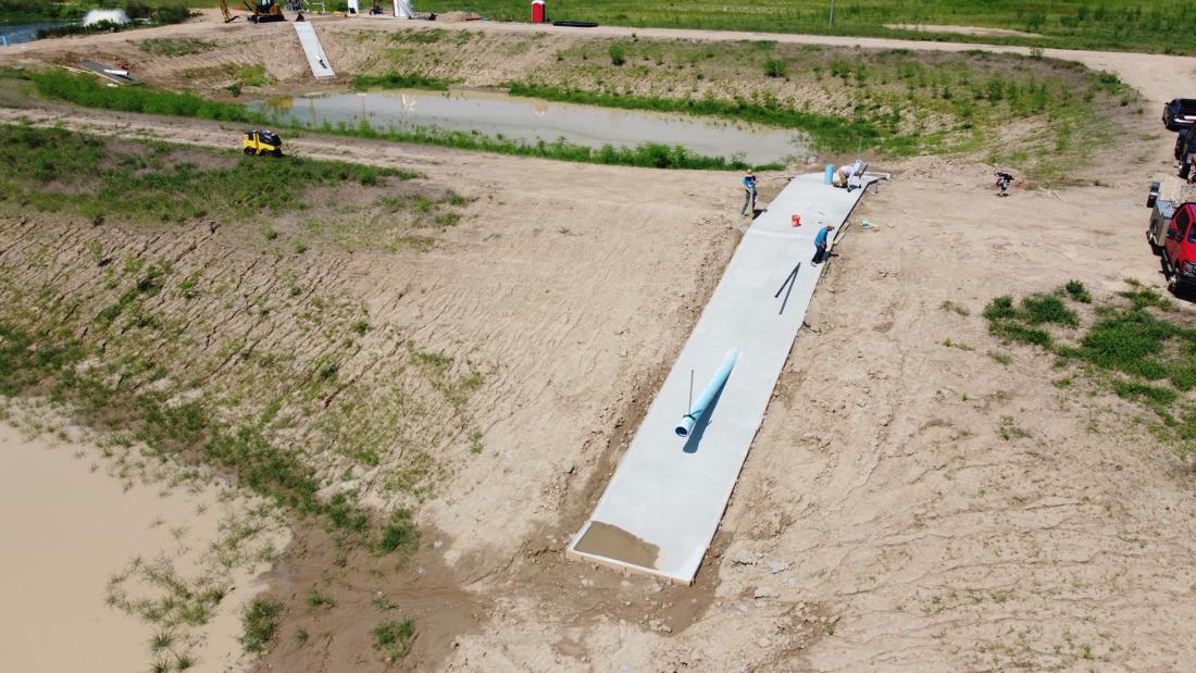 Aerial view of concrete and pipe work at the new cells