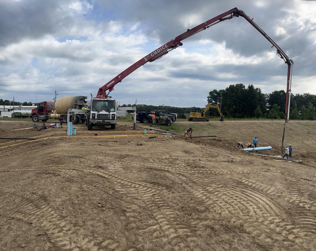 Pouring concrete with a boom pump