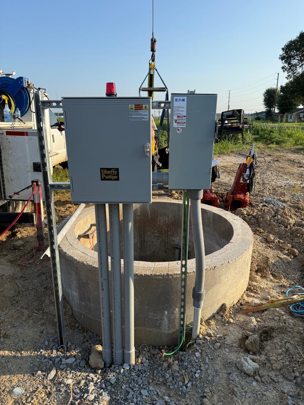 Control panels and conduit at the wet well