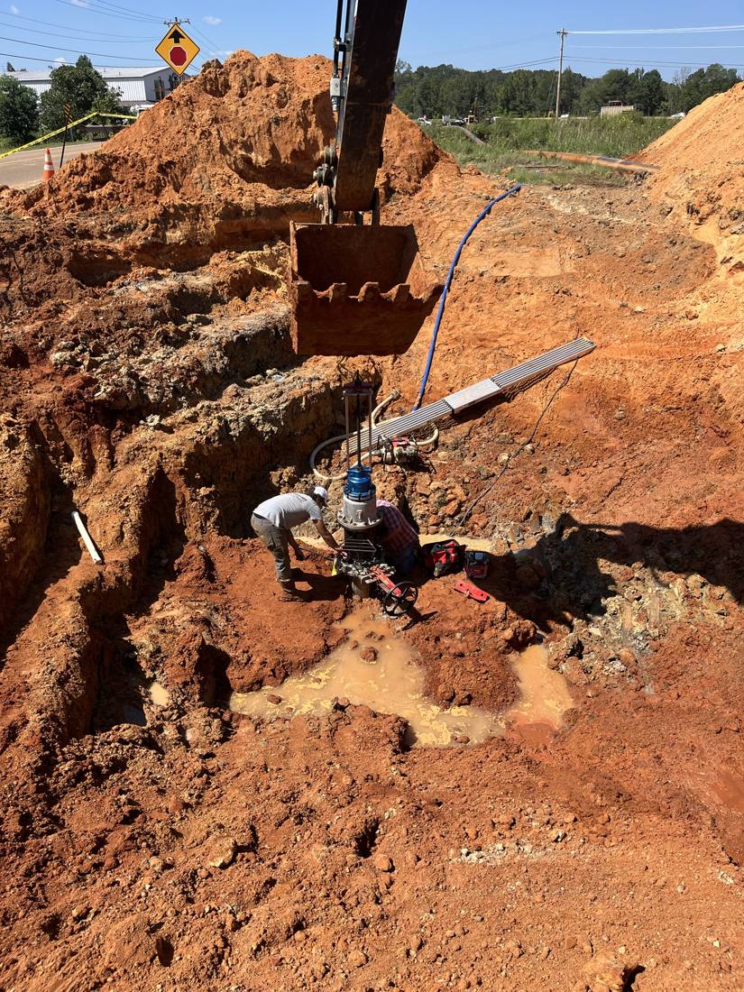 Insertion valve job: setting a large valve in a deep excavation