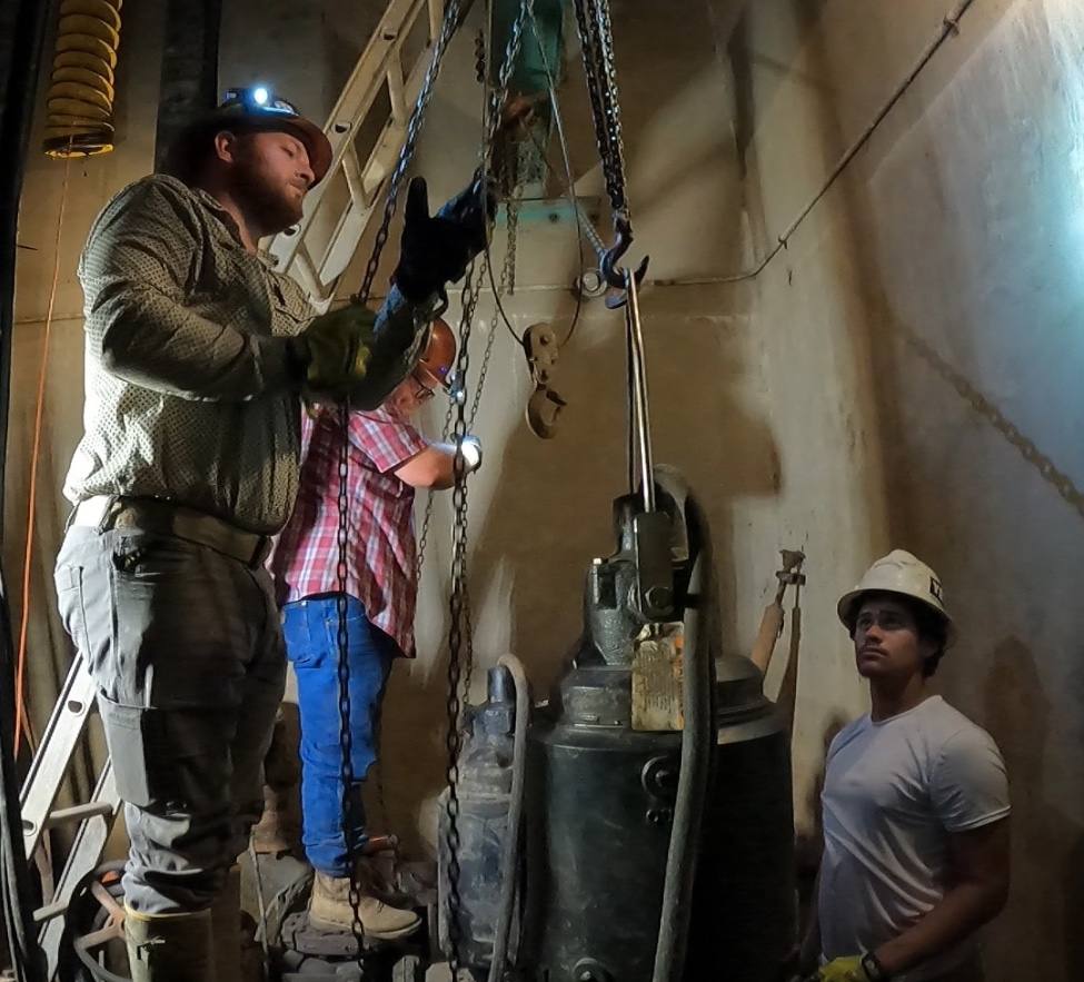 Pulling a large pump with chain hoists
